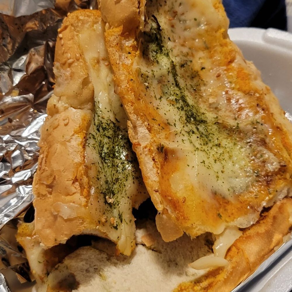 Freddy’s Pizza - Awfull garlic cheese bread.all stuck together and soggy - Pizza Near Me - Oxnard, California