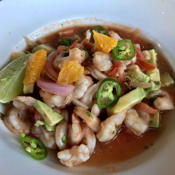 Cha Cha's Latin Kitchen - Shrimp Cerviche: marinated in fresh orange and lime juices, serrano chile, red onion and hass avocado served with corn chips - Bars Near Me - Brea, California