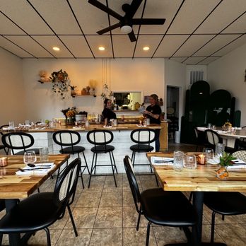 Clemmy’s - a dining room with tables and chairs - New American Near Me - Waretown, New Jersey