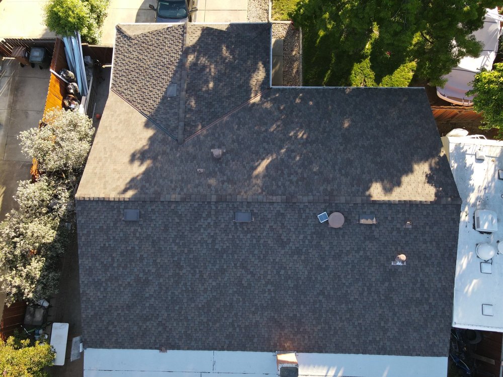 Slide of East Bay Roofing