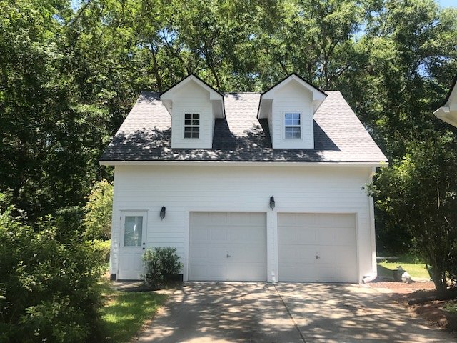 Slide of Rick Ross Exteriors and Roofing