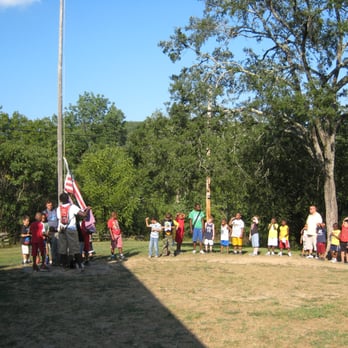 Sherwood Forest - The kids raise the flag every morning before breakfast, and lower it before dinner. And learn to stand silently out of respect! - Summer Camps Near Me - St. Louis, Missouri Sherwood Forest - The kids raise the flag every morning before breakfast, and lower it before dinner. And learn to stand silently out of respect! - Summer Camps Near Me - St. Louis, Missouri