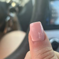 A2Z Nails Spa & Lashes - Inconsistent and over-saturated bead leaving a lumpy nail that doesn't go all the way up to the cutical