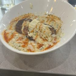 PacQ’s Kitchen - Salmon cakes and grits