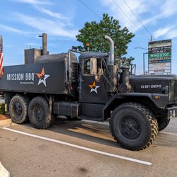 Mission Bbq - Military truck for Mission BBQ with American flags on the back. I love it. The American Way. Located in Skibo Marketplace.