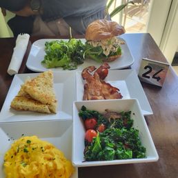Eggs sautéed spinach w/ tomatoes toast and bacon chicken croissant w/ salad Eggs sautéed spinach w/ tomatoes toast and bacon chicken croissant w/ salad