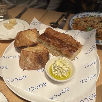 Rocca - Bread service ; lemon butter sea salt - Italian Near Me - Tampa, Florida Rocca - Bread service ; lemon butter sea salt - Italian Near Me - Tampa, Florida