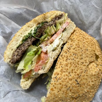 Chef Burger - a half eaten sandwich with lettuce and tomato - Burgers Near Me - Richmond Hill, Ontario Chef Burger - a half eaten sandwich with lettuce and tomato - Burgers Near Me - Richmond Hill, Ontario