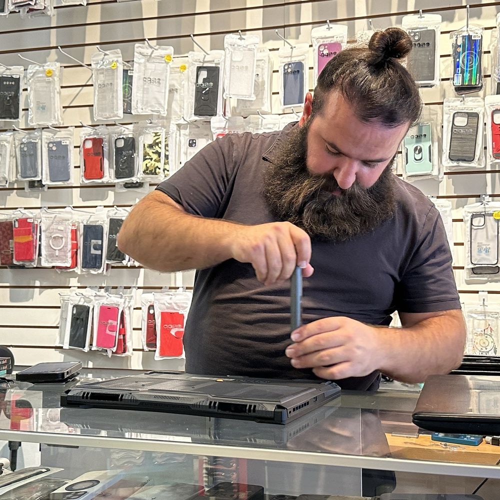 BayCell - After fixing the hinge Erish started work on the guts of it - Electronics Repair Near Me - San Mateo, California BayCell - After fixing the hinge Erish started work on the guts of it - Electronics Repair Near Me - San Mateo, California