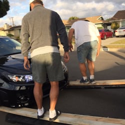 Transauto Logistics - Neighbors had to step on the wood to help the driver drive it without scraping the front to the metal