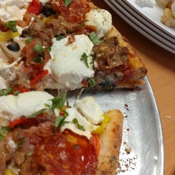 Genna Pizza - Double layer. 31 toppings. Ridiculous huge and taste amazing. Supreme pizza on steroids. - Pizza Near Me - Melbourne, Florida Genna Pizza - Double layer. 31 toppings. Ridiculous huge and taste amazing. Supreme pizza on steroids. - Pizza Near Me - Melbourne, Florida