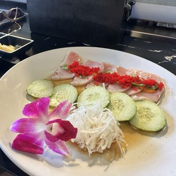 Bluefin Sushi & Ramen - Sliced yellowtail in ponzu sauce. - Sushi Bars Near Me - San Antonio, Texas Bluefin Sushi & Ramen - Sliced yellowtail in ponzu sauce. - Sushi Bars Near Me - San Antonio, Texas