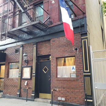 Chez Napoleon - A modest front facing door offers the most authentic French food experience inside. - French Near Me - New York, New York Chez Napoleon - A modest front facing door offers the most authentic French food experience inside. - French Near Me - New York, New York