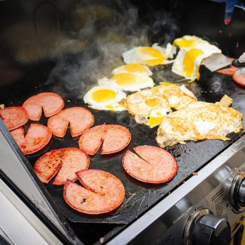 Jersey Cowboy - sausages and eggs cooking on a grill - Breakfast & Brunch Near Me - Fort Collins, Colorado