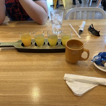 Scrambled - Mimosa flight (swapped cranberry for pineapple) and coffee - Breakfast & Brunch Near Me - Henderson, Nevada Scrambled - Mimosa flight (swapped cranberry for pineapple) and coffee - Breakfast & Brunch Near Me - Henderson, Nevada