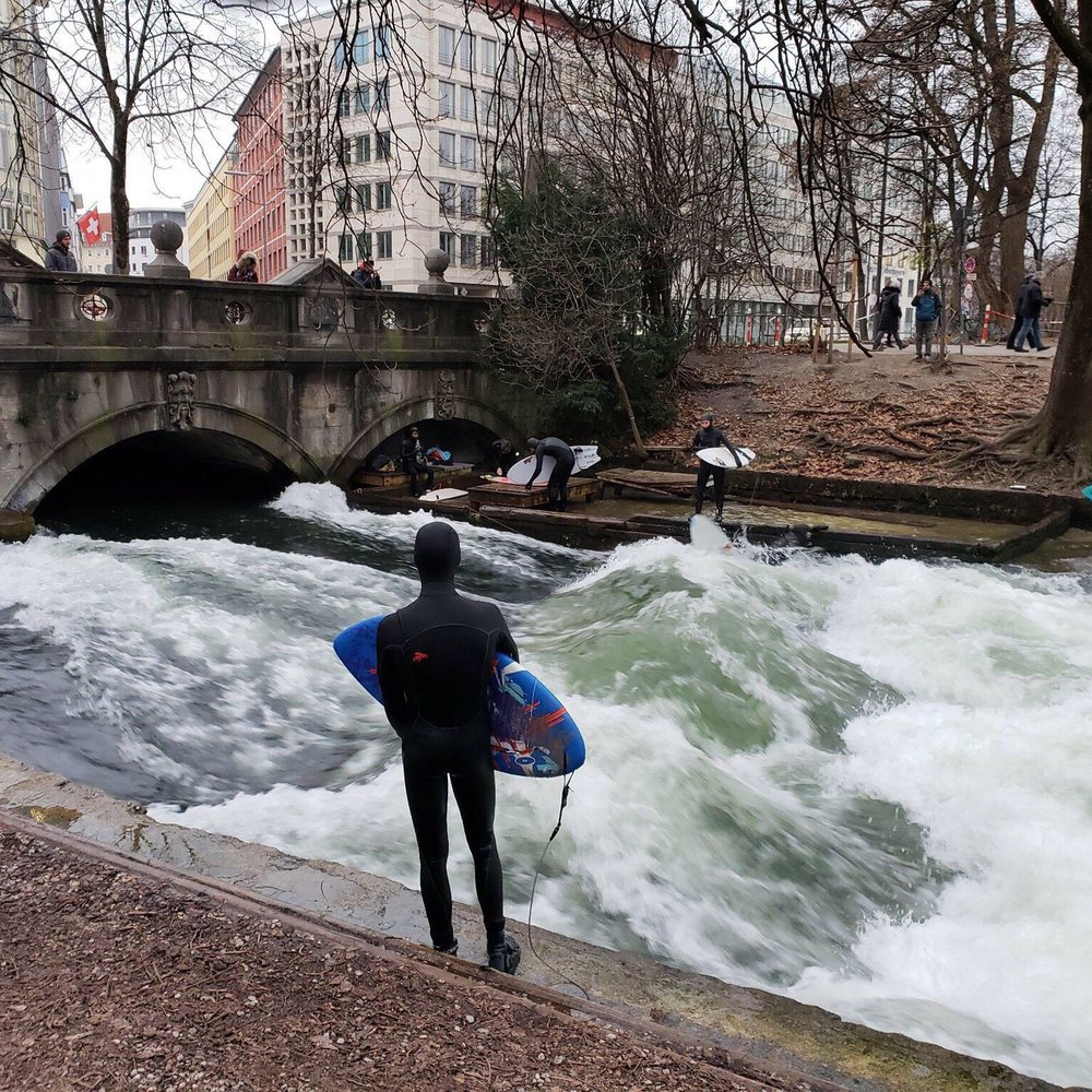 Eisbach-Welle - Winter surfing - Landmarks & Historical Buildings Near Me - Munich, BY Eisbach-Welle - Winter surfing - Landmarks & Historical Buildings Near Me - Munich, BY