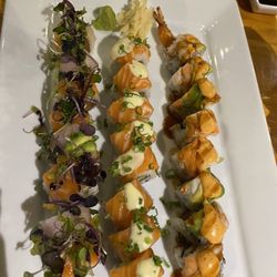 Blue Samurai Sushi Bar & Grill - 3 rolls with salmon and tuna - I was trying to eat all that myself but it didn't work- leftovers!