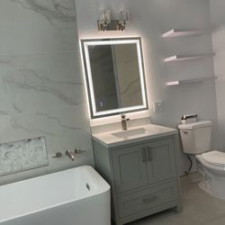 Alpha Star Enterprises - 30 inch cabinet, LED mirror and freestanding tub