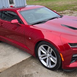 Kustom Kolors Collision Repair - Paint and repair in passenger side windshield panel.