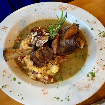 Chef Rick's - creole lamb shank with sweet corn polenta - New American Near Me - Orcutt, California Chef Rick's - creole lamb shank with sweet corn polenta - New American Near Me - Orcutt, California