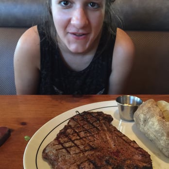 Saltgrass Steak House - Alex posing w/ the T-Bone Steak! - Steakhouses Near Me - Webster, Texas