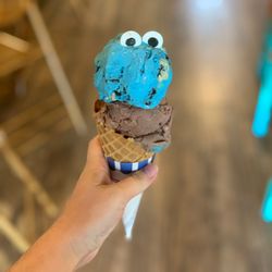 Cookie Monster and chocolate ice cream in a cone