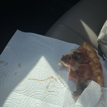 Magic Mikes Pizza - Clear stringy pieces, when I chewed them they felt rubbery, like thin rubber bands mixed with the cheese in my pizza - Pizza Near Me - Westminster, California