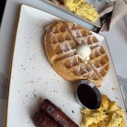 Tri fecta/ Two eggs a Belgian waffle bacon and sausage link come with blueberries in a sauce Tri fecta/ Two eggs a Belgian waffle bacon and sausage link come with blueberries in a sauce