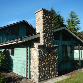 Powers Chimney & Masonry - We veneered this chimney in Natural Stream Stone. - Masonry/Concrete Near Me - Seattle, Washington Powers Chimney & Masonry - We veneered this chimney in Natural Stream Stone. - Masonry/Concrete Near Me - Seattle, Washington