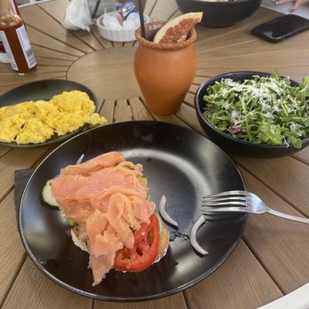 Toast Downey - Avocado toast with salmon, scrambled eggs, arugula salad, and mimosa cantarito. - Breakfast & Brunch Near Me - Downey, California Toast Downey - Avocado toast with salmon, scrambled eggs, arugula salad, and mimosa cantarito. - Breakfast & Brunch Near Me - Downey, California