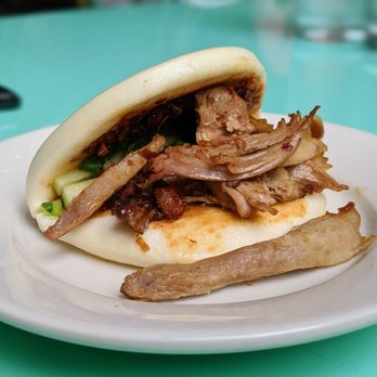 Ruby Chow's - Peking Duck Steamed Bun. Duck skin confit, cucumber, scallions, hoisin, star anise jus. $5. - Asian Fusion Near Me - Atlanta, Georgia