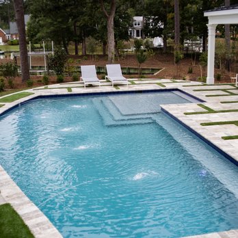 Visionscapes Land Design - Pool deck with synthetic turf and outdoor living area. - Landscaping Near Me - Chesapeake, Virginia Visionscapes Land Design - Pool deck with synthetic turf and outdoor living area. - Landscaping Near Me - Chesapeake, Virginia