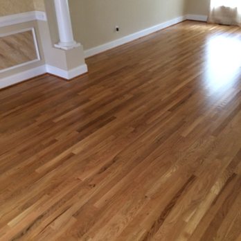 Colonial Floors - a hardwood floor in a living room - Flooring Near Me