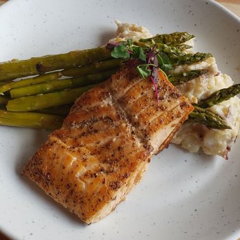Spindle's Filling Station - Grilled salmon dish - American Near Me - Wilmington, North Carolina Spindle's Filling Station - Grilled salmon dish - American Near Me - Wilmington, North Carolina