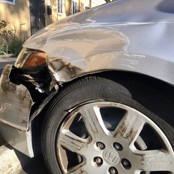 Kim's Auto Body - Before repairs showing major bumper, fender, and headlight damage - Body Shops Near Me - Santa Clara, California