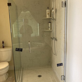Distinctive Tile & Stone - a walk in shower - General Contractors Near Me - Olympia, Washington