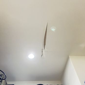 Harmonic Construction - Close up view , Sheetrock damage. - General Contractors Near Me