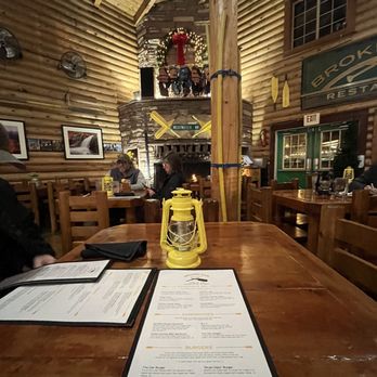 Broken Oar Restaurant - a table with a lantern on it - American Near Me - Moab, Utah