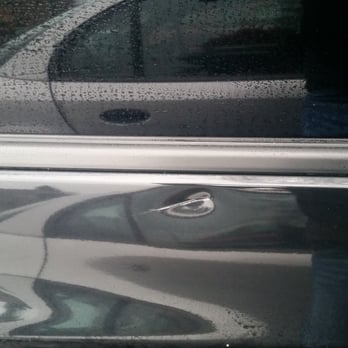 Firestone Complete Auto Care - The large dent/scratch my car came out of shop with. No way this was a door ding in parking lot-way too high, by window. - Tires Near Me - Northville, Michigan