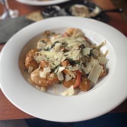 Weekly special - shrimp with house-made gnocchi in a while wine sauce with tomatoes, spinach, onions and Parmesan Weekly special - shrimp with house-made gnocchi in a while wine sauce with tomatoes, spinach, onions and Parmesan