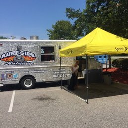 a food truck parked in a parking lot