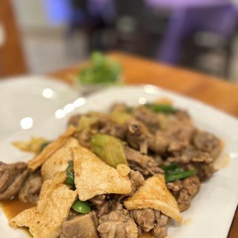 Yummy Taste - a plate of food on a table - Szechuan Near Me - Orlando, Florida