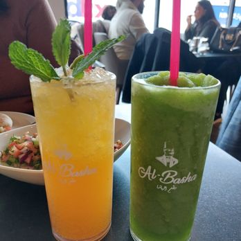 Al-Basha - Sparkling Mango Refresher (L); Mint Lemonade (R) - Middle Eastern Near Me - Paterson, New Jersey Al-Basha - Sparkling Mango Refresher (L); Mint Lemonade (R) - Middle Eastern Near Me - Paterson, New Jersey