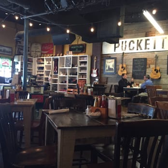 Puckett's Restaurant - Mini stage at night, dining area during the day. - Barbeque Near Me - Franklin, Tennessee Puckett's Restaurant - Mini stage at night, dining area during the day. - Barbeque Near Me - Franklin, Tennessee