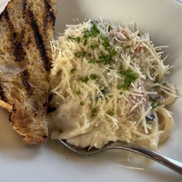 Delicious bread and Pasta Alfredo Delicious bread and Pasta Alfredo