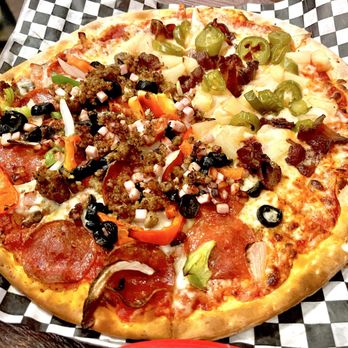 Davanza's - Half spicy luau, half spicy mucker supreme. - Pizza Near Me - Park City, Utah