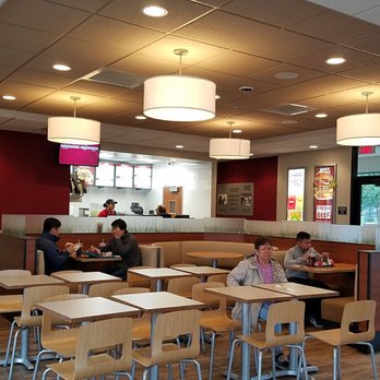 Wendy's - people sitting at tables in a restaurant - Fast Food Near Me - Anchorage, Alaska