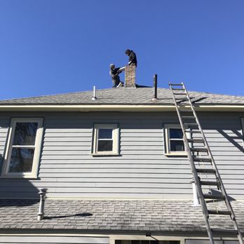 Jack Hill's Stove Shop - Bill and James hard at work. - Chimney Sweeps Near Me - Hull, Massachusetts Jack Hill's Stove Shop - Bill and James hard at work. - Chimney Sweeps Near Me - Hull, Massachusetts