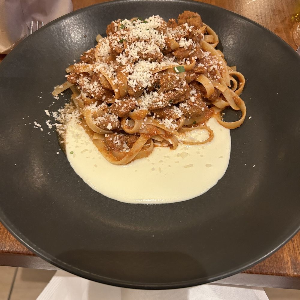 Sotto Sotto - Fettuccine al ragù d'agnello con fonduta di Pecorino - Italian Near Me - Bath, BAS Sotto Sotto - Fettuccine al ragù d'agnello con fonduta di Pecorino - Italian Near Me - Bath, BAS
