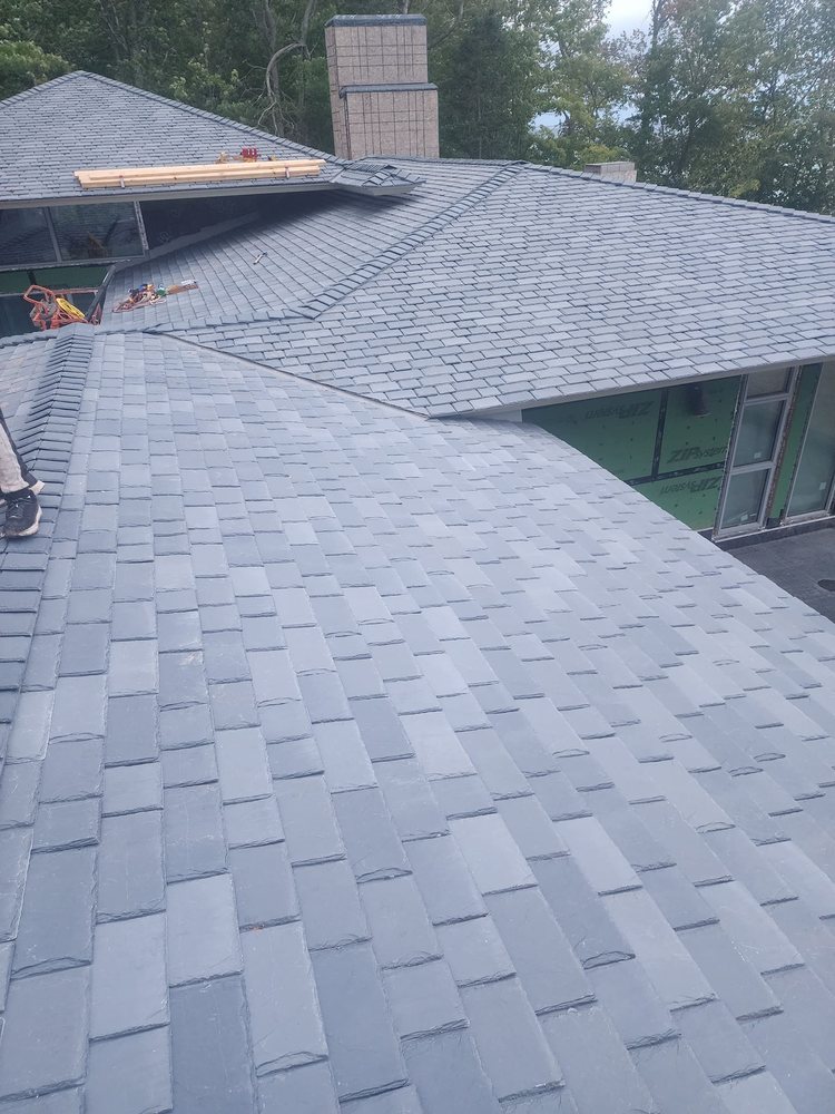 Slide of Archyk Roofing